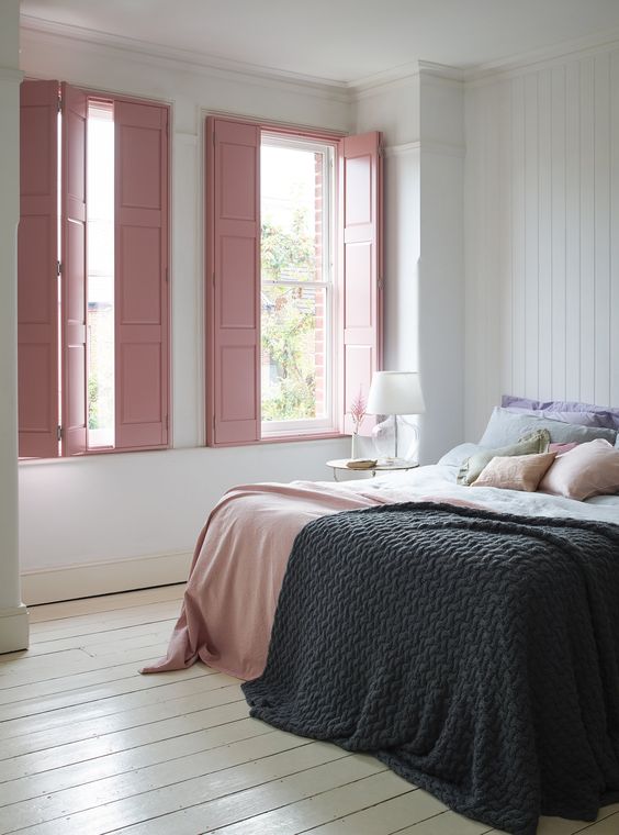 such vintage-style solid pink shutters will add interest and a soft touch of color to your space - just add some touches to echo them