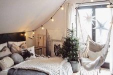 19 a faux fur rug and lots of pillows and layered blankets easily make this attic bedroom very welcoming and cozy