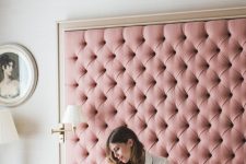 21 a glam pink upholstered oversized headboard with a gold frame is a chic idea with a girlish feel