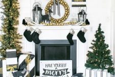 30 gorgeous glam Christmas decor with gold ornaments, black stockings, striped black and white gifts and lights is chic