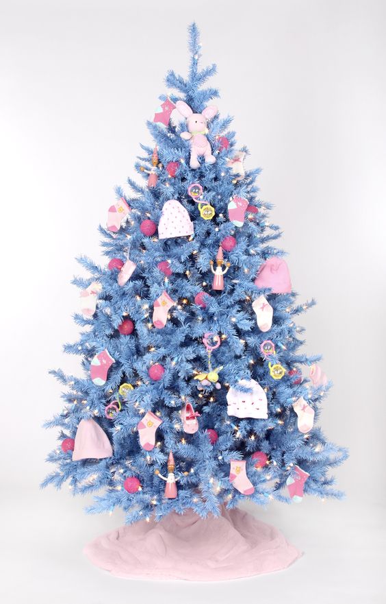 a light blue Christmas tree with various ornaments, socks, beanies and plush toys plus lights will be a nice solution for your kids' room