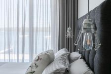 34 semi sheer grey curtains paired with thicker grey ones for delicate window treating and matching the color scheme