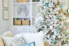 a cute coastal living room decorated for Christmas
