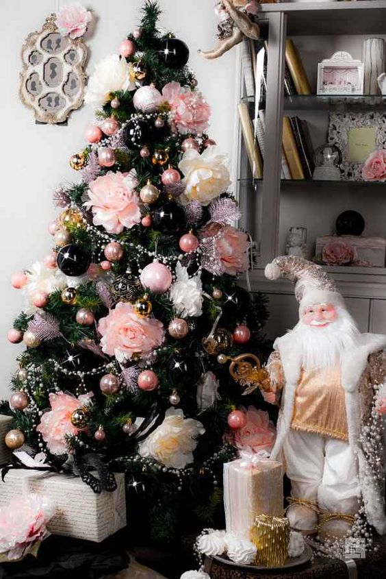 a glam Christmas tree with pink, black and dusty pink ornaments, neutral and pink oversized blooms, beads is a chic idea