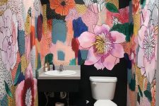 a maximalist mudroom with bold floral walls and all neutral everything else plus a lamp on the ceiling is a veyr unusual solution