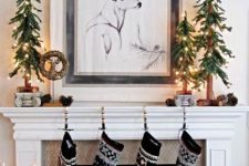 beautiful black and white stockings will style your mantel for Christmas in a chic way, they are all that you need