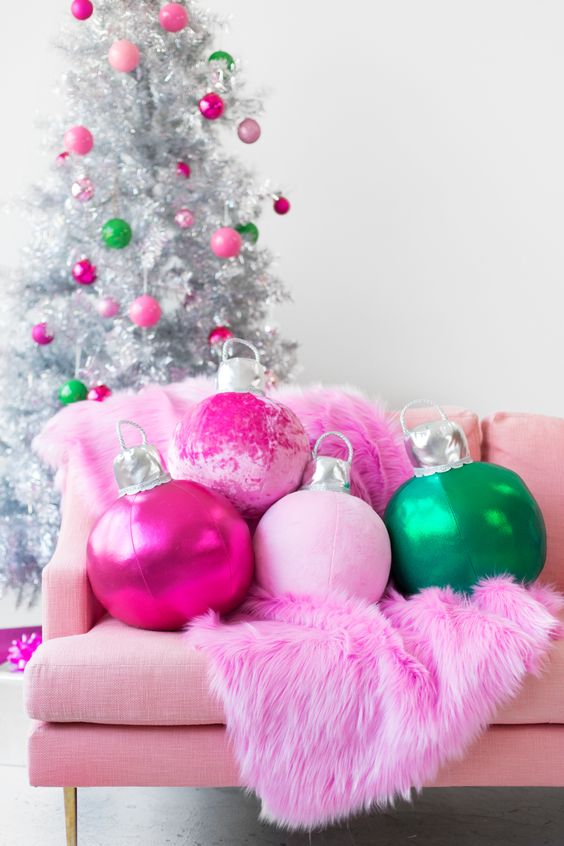 bright oversized Christmas ornament pillows are amazing decor for holidays, they look very fresh, edgy and bold
