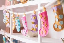 cute Christmas stockings on a bookcase