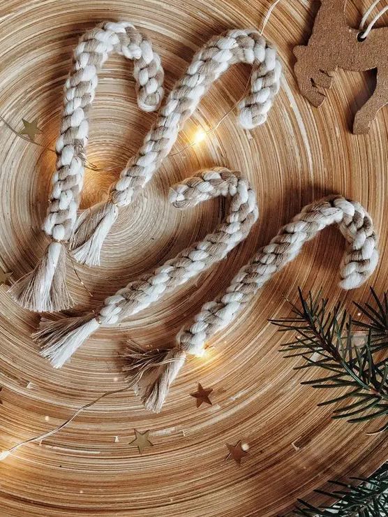 neutral woven candy canes with tassels can be a nice decor idea for Christmas, hang them wherever you want