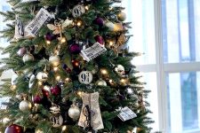 03 a fabulous Harry Potted inspired Christmas tree with deep purple, silver and gold ornaments, newspapers, owls, glasses and lights