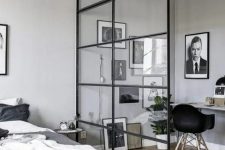 05 a masculine bedroom and a workspace separated with a glazed framed wall is a cool way to organize a space
