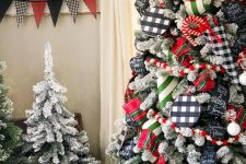 06 a bold Christmas tree with buffalo check and bright stripe decor and detailing, candy canes and bright beads is pure fun