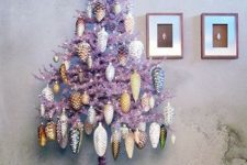 07 a lilac Christmas tree with silver, white, gold and yellow pinecone-shaped ornaments is a creative idea to stand out at Christmas