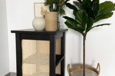 17 a gorgeous rustic IKEA Bekvam hack with black paint and rattan net is a super stylish solution for a modern space