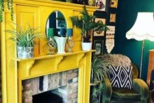 19 a brick fireplace with a sunny yellow surround, lots of plants and candles is a very cozy idea that will add a bit of sun here