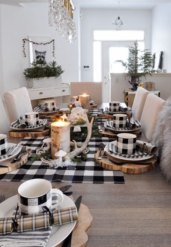 a buffalo check table runner, mugs and napkins for a cozy woodland Christmas tablescape