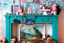 23 a bright space with floral wallpaper, a faux fireplace with a turquoise mantel, a bright gallery wall and bold decor