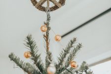 25 a peace sign made of vine is a perfect Christmas tree topper for a boho space, it looks unusual, fresh and matches the style perfectly