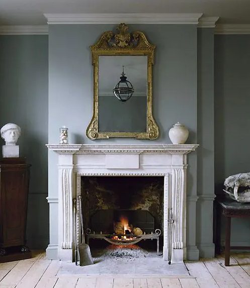 this beautiful vintage fireplace with a refined white mantel is a stylish idea to add chic to the living room and make it wow