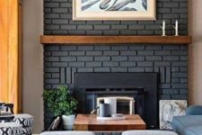 36 an elegant modern living room with a grey brick fireplace, a staine dmantel, lots of print for more interest and chic