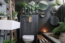 a stylish moody bathroom design