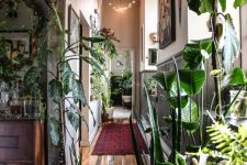 49 a lovely home jungle – a biophilic space with lots of potted plants all over it is a cool idea to rock