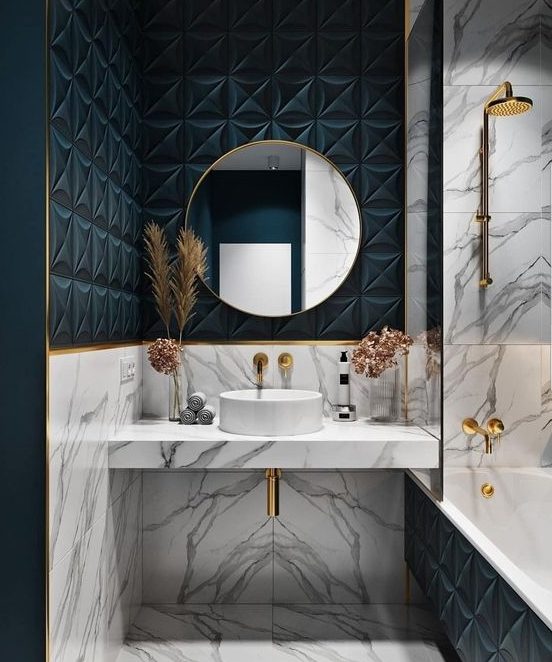 a bright bathroom with teal panels, white marble and gold hardware is a very chic and bold idea