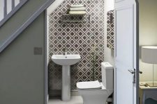 a contemporary under-stairs powder room design