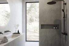 a minimalist concrete bathroom with a monolith vanity with a sink, a shower space with a niche, a large window for a view