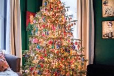 a super bright and maximalist Christmas tree with lights and colorful vintage ornaments and beads is a cool idea