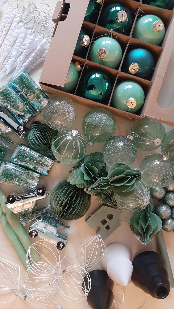 a whole arrangement of mint and green ornaments, semi sheer, usual baubles and paper ornaments for Christmas