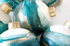 catchy teal and copper Christmas ornaments will be a very chic and bright solution for the holidays