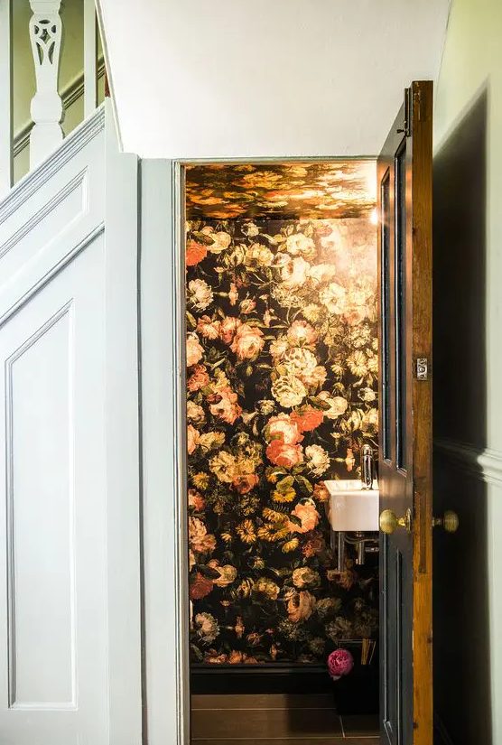 decorate your powder room with dramatic floral wallpaper to make it really wow and edgy