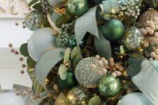 light green and green ribbons and matching ornaments plus berries for super lush and colorful Christmas decor
