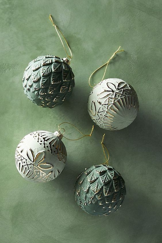 Vintage style green Christmas ornaments with gold details are adorable to style your tree for the winter