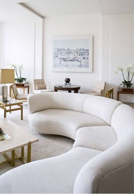 a gorgeous oversized creamy curved sectional sofa like this one will easily become a statement piece in your living room