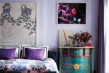 18 a vintage very peri bedroom with vintage teal furniture, some art and purple and pink textiles