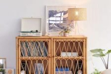 24 a chic and cool rattan media console is a stylish idea for a boho or mid-century modern space