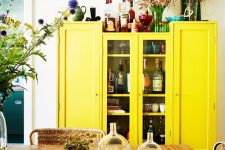 26 add a bold sunny yellow buffet to your neutral space to make it shine bright and feel like sunshine