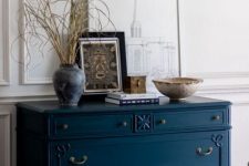 33 a beautiful vintage navy dresser with delicate matte handles and knobs is a very refined solution for your space