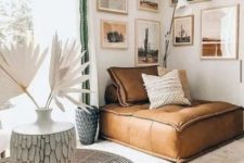 48 a cozy reading nook with a desert gallery wall and a brown leather daybed in the corner – a favorite piece with much comfort provided