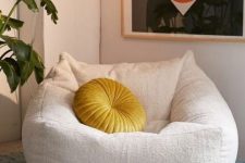 50 create your own welcoming space with such a lovely and soft chair with a bright pillow and rug and make it your perfect spot