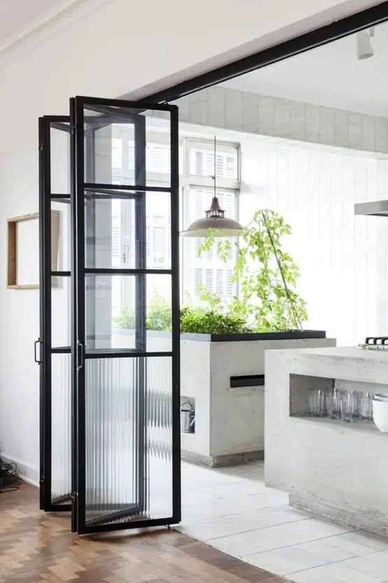a folding glass door is a nice solution to separate any space