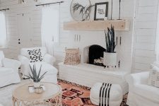 a cozy boho living room design with white walls
