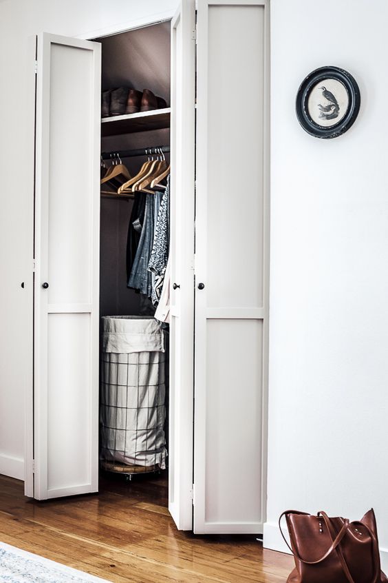 bi fold doors are always a good idea for a closet, they don't take up your precious space here and are comfortable in using