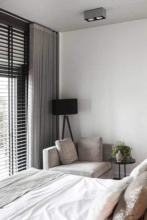 black blinds and grey curtains are a great combo for a minimalist or contemporary space, a very functional and stylish one