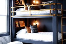 a cool modern bedroom in black and white, with a bunk bed and a storage drawer under the lower one to store various stuff