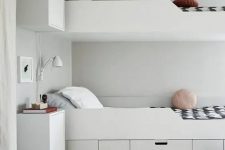 13 a minimalist white bed with storage compartments and drawers is a lovely piece for a modern space and the compartments are comfy to use