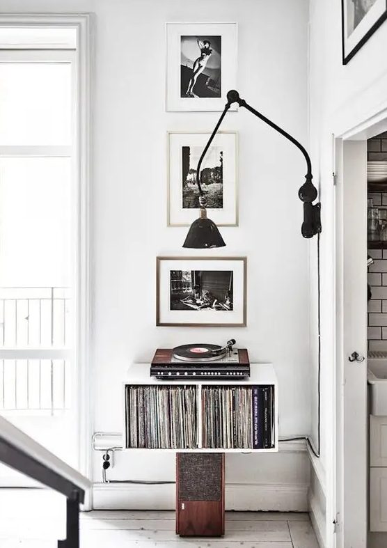 a small nook used for storing vinyl and for playing it too   only for melomans and vintage lovers