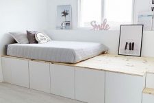 30 a neutral bedroom with a platform bed that shows off a lot of storage space underneath is a very creative idea